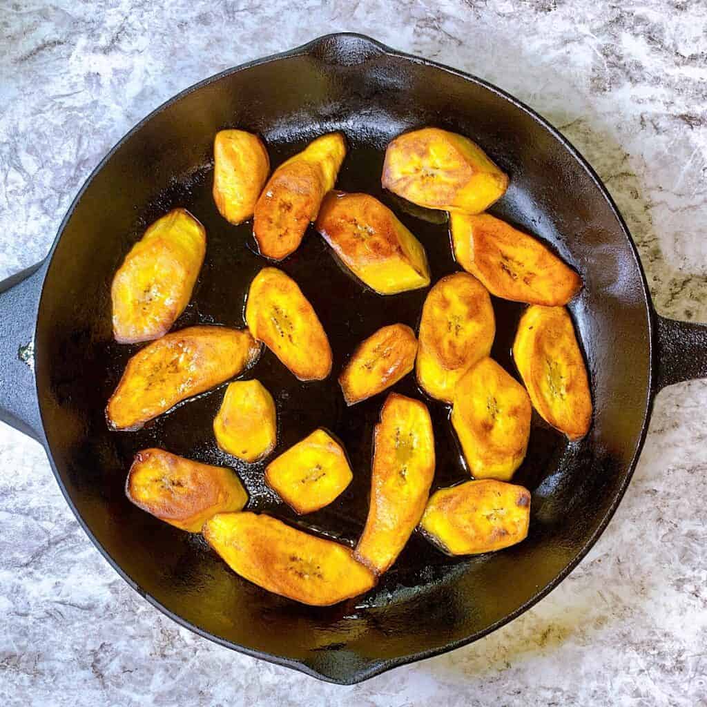 Fried plantains in a cast iron skillet