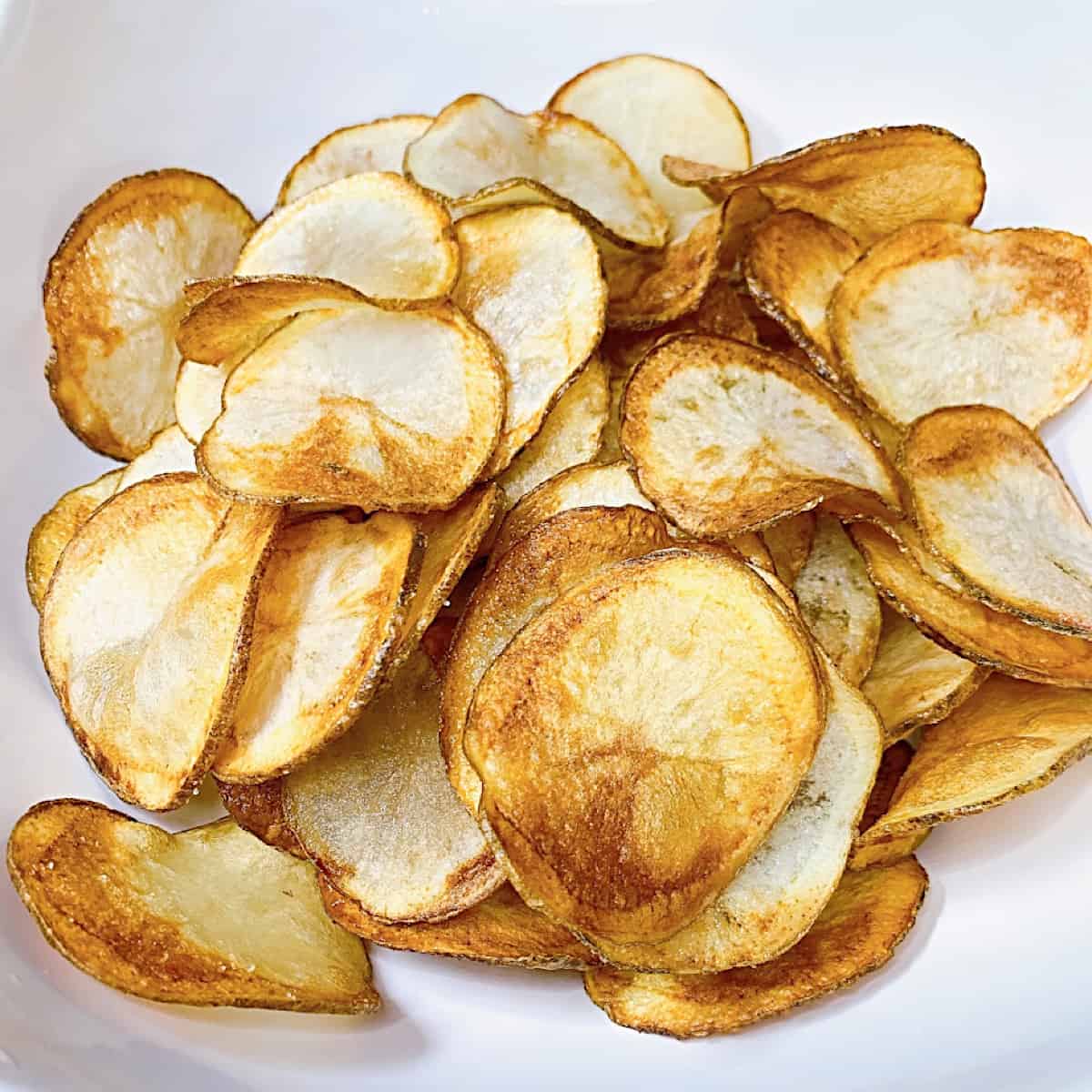 Homemade Potato Chipsβ in large ceramic bowl