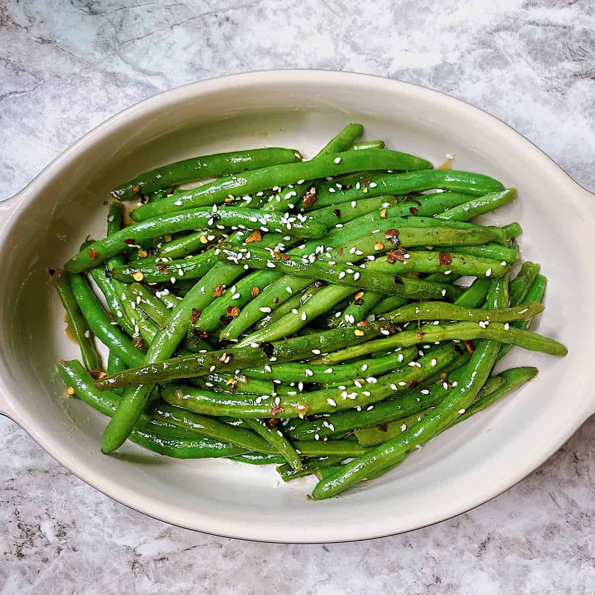 Sweet and Spicy Asian Style Green Beans in casserole dish