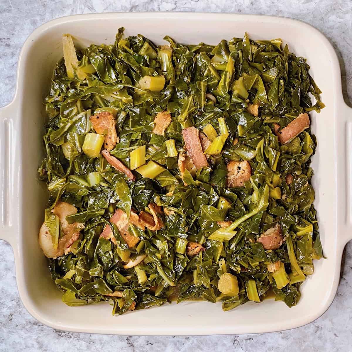 Collard Greens with bacon in casserole dish