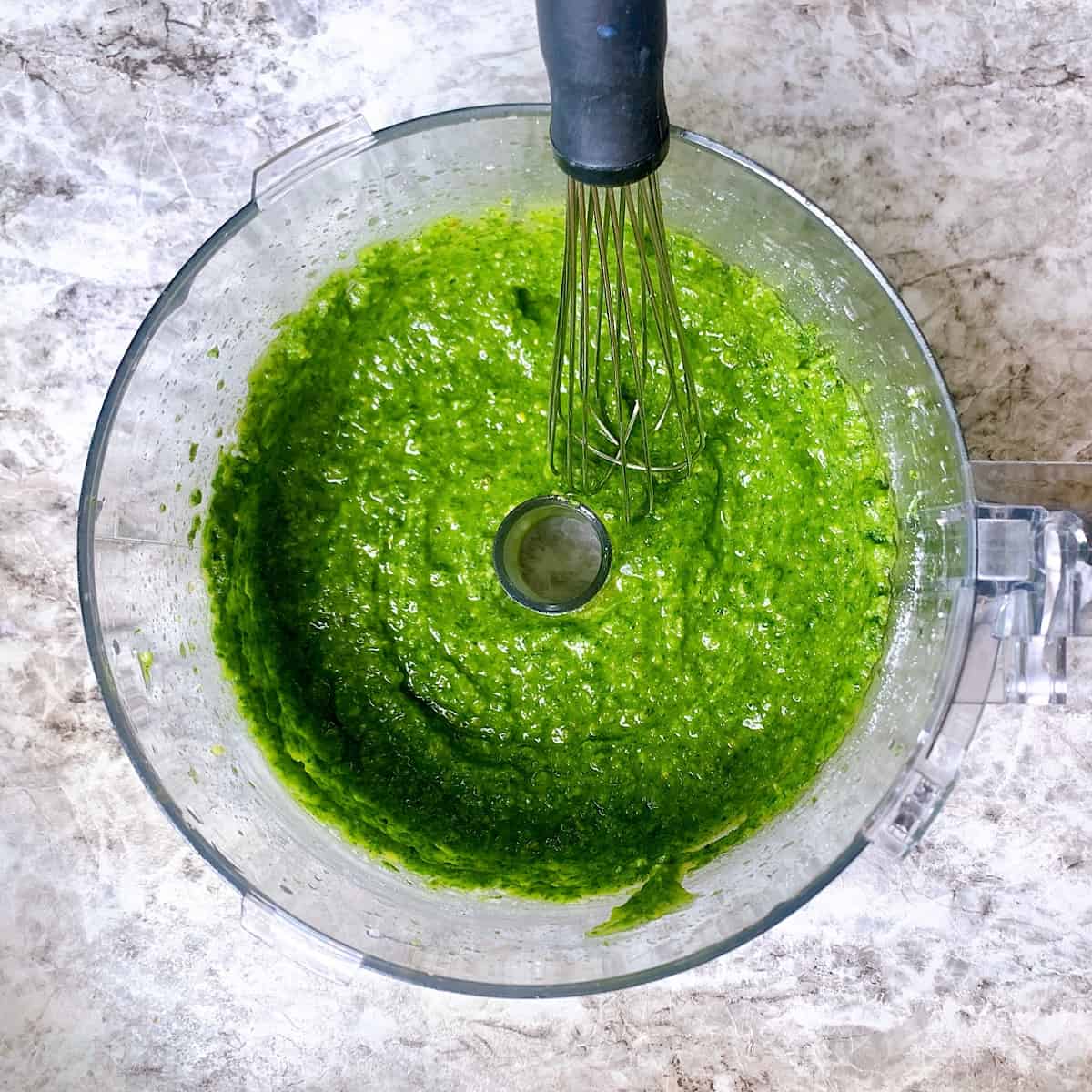 Basil in a good processor ground