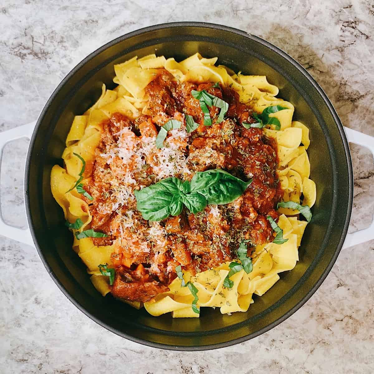 Short Rib Ragu over Pappardelle in white Staub Pot