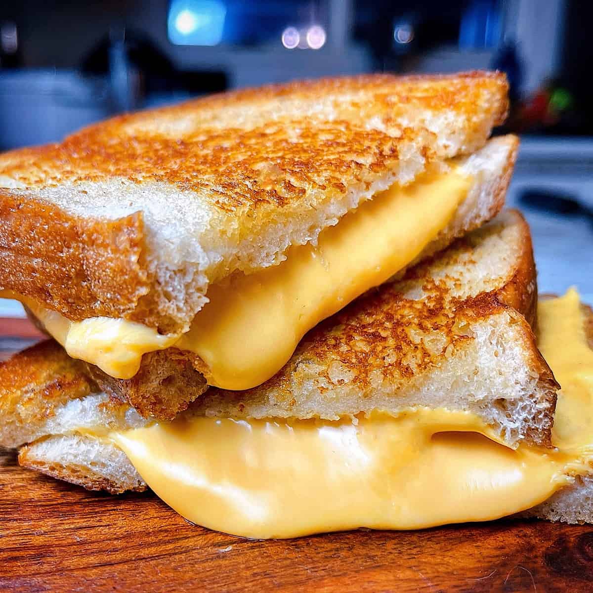 All American Grilled Cheese on wooden cutting board