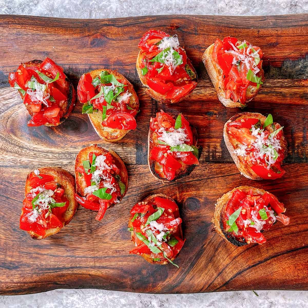 Tomato medley bruschetta on a crystal platter