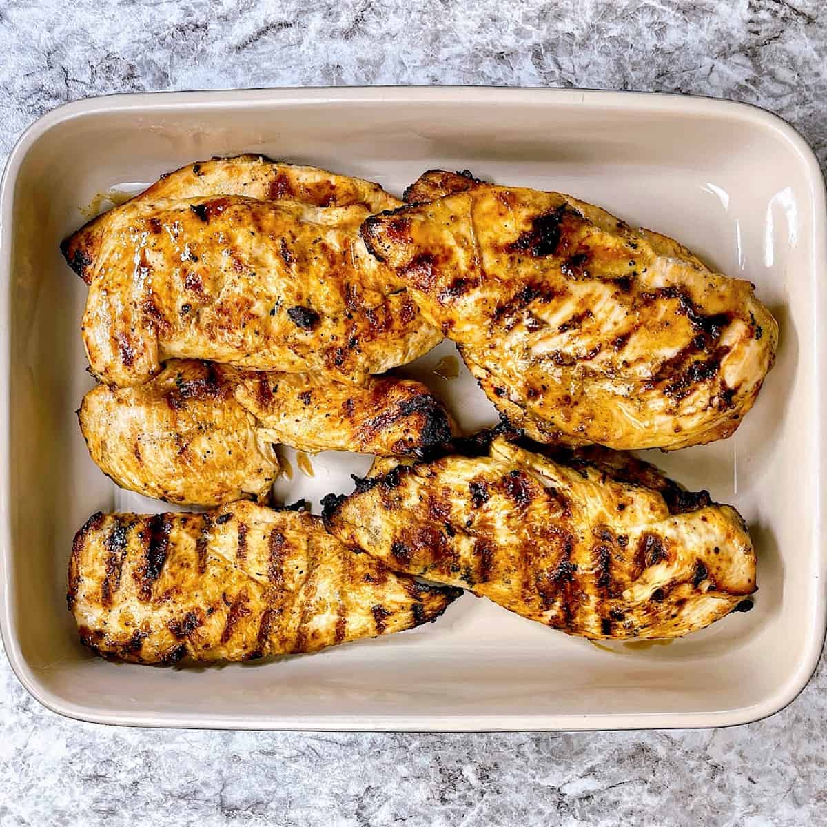 Marinated Grilled Chickenβ in casserole dish
