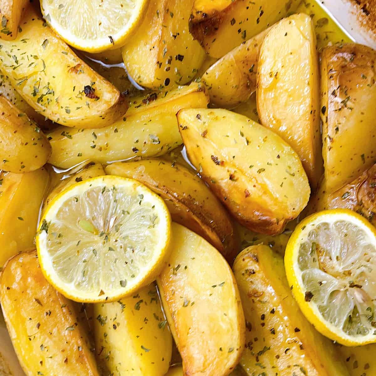Greek Lemon Potatoes close up with lemon