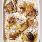 A casserole dish filled with rice and chicken.