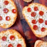 Texas Toast Pizza displayed on a wooden board.