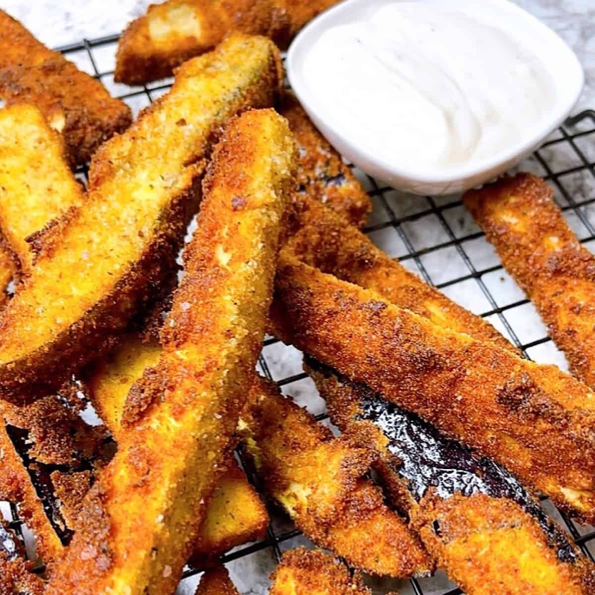 Eggplant Fries with Garlic Aioli on wire rack