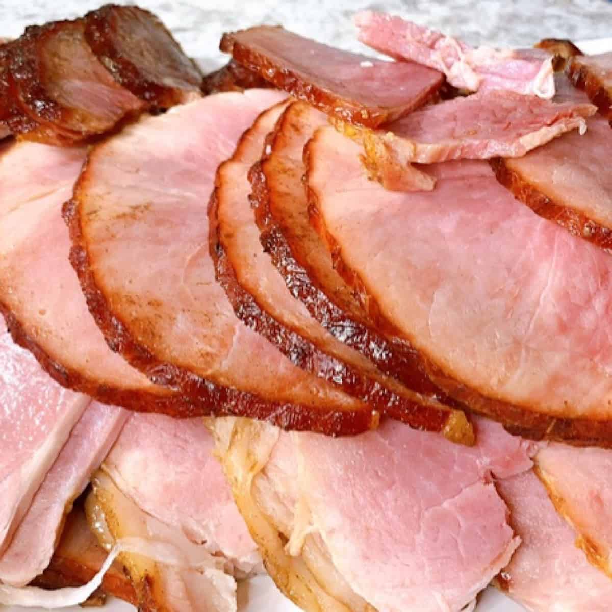 Honey baked ham sliced and plated
