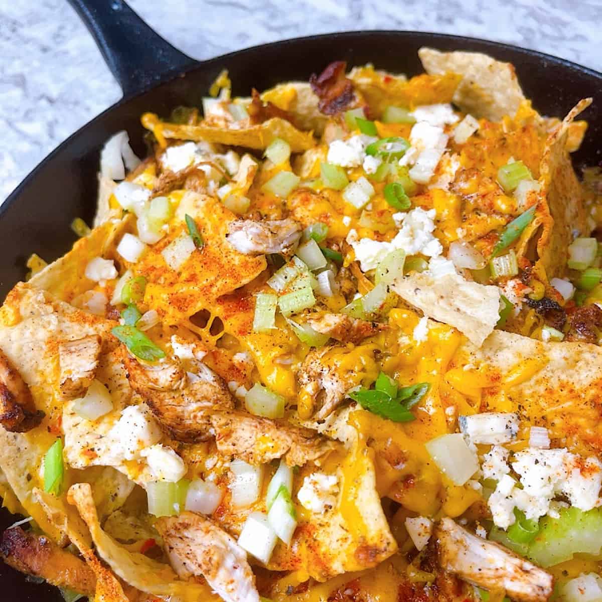 Nashville Hot Chicken ™️ Nachos in cast iron skillet