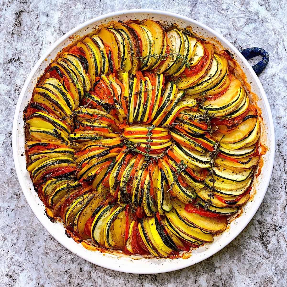 Ratatouille in circular white ceramic dish