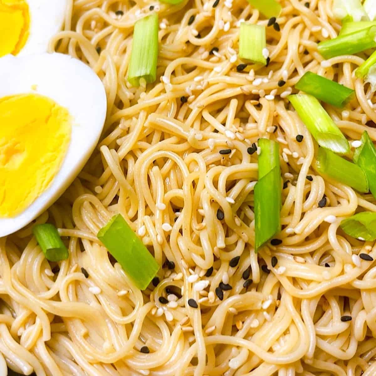 Rice Ramen Bowl with sesame seeds and a split boiled egg