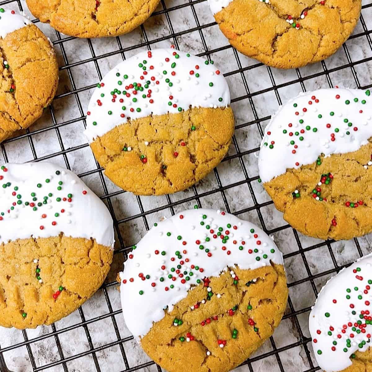 Snow Capped Icing Peanut Butter Cookies on wire rack