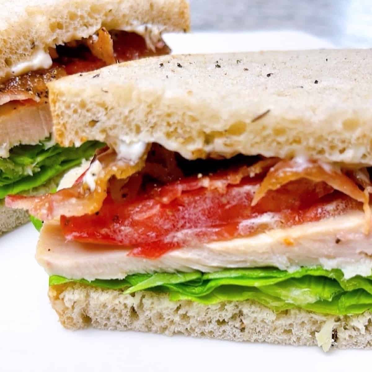 Turkey and Bacon on Rye cut in half