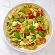 Casarecce pasta with baby heirloom tomatoes and artichoke feature image