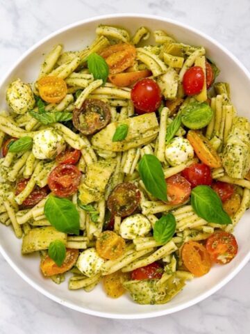 Casarecce pasta with baby heirloom tomatoes and artichoke feature image