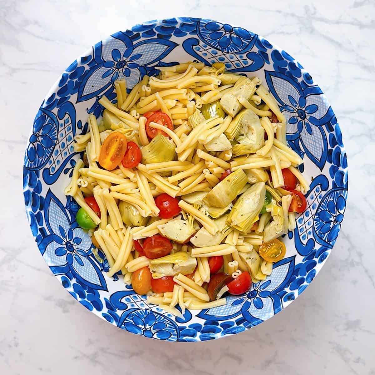 pasta caserecce in a mixing bowl without dressing