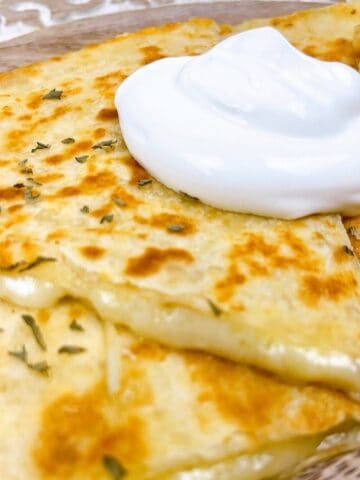 close up of cheese quesadilla feature image