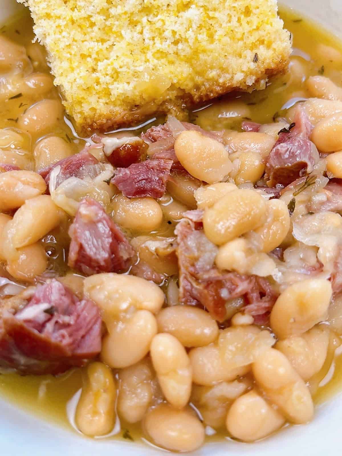 Instant Pot Ham and Beans Hero shot.  Close up with cornbread.