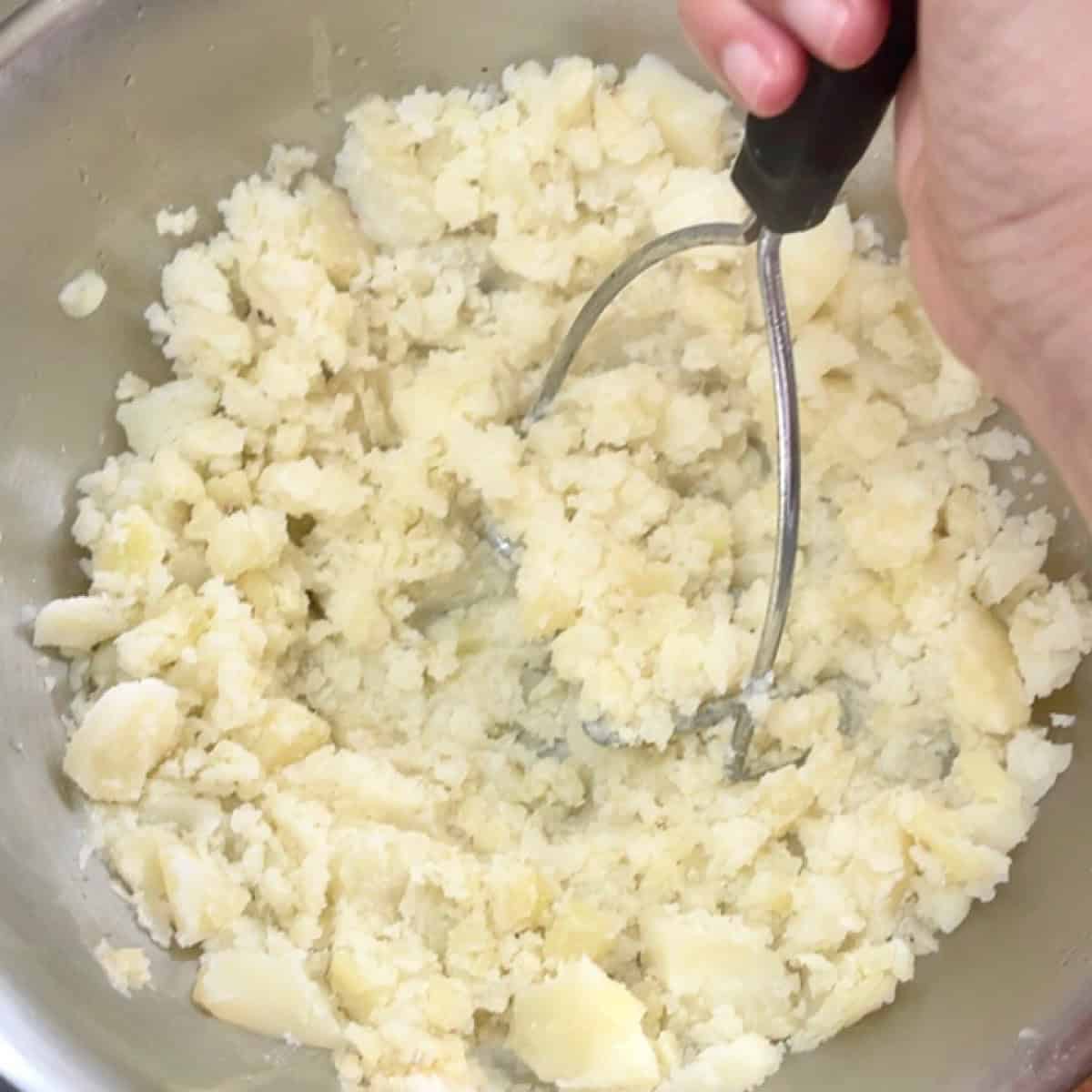 Traditional Skordalia Greek Potato Dip Recipe with Garlic Process 3 potato mashing