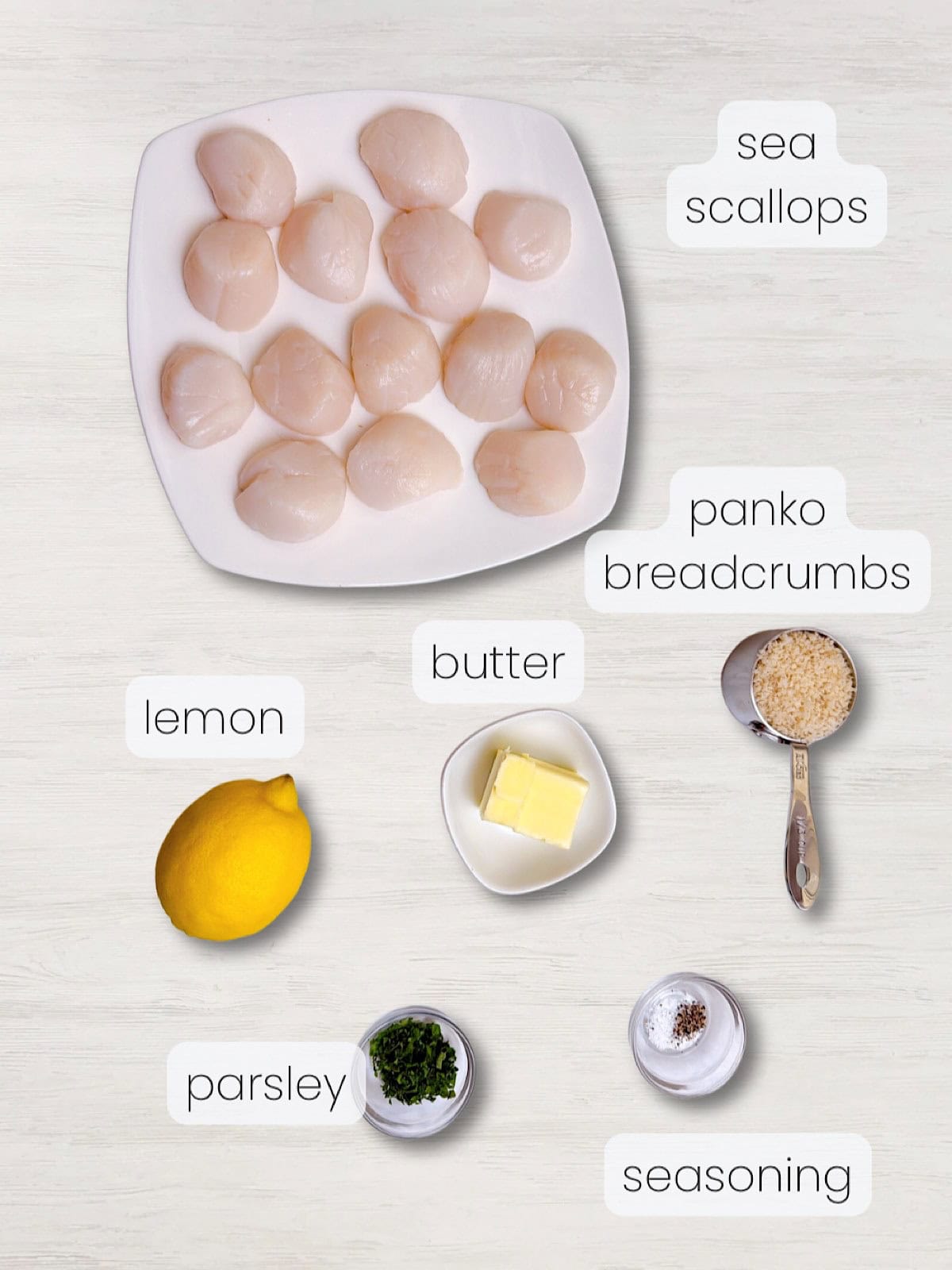 A labeled image of everything needed to make this baked scallops recipe.
