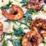 spicy tortellini alfredo with blackened shrimp feature image close up