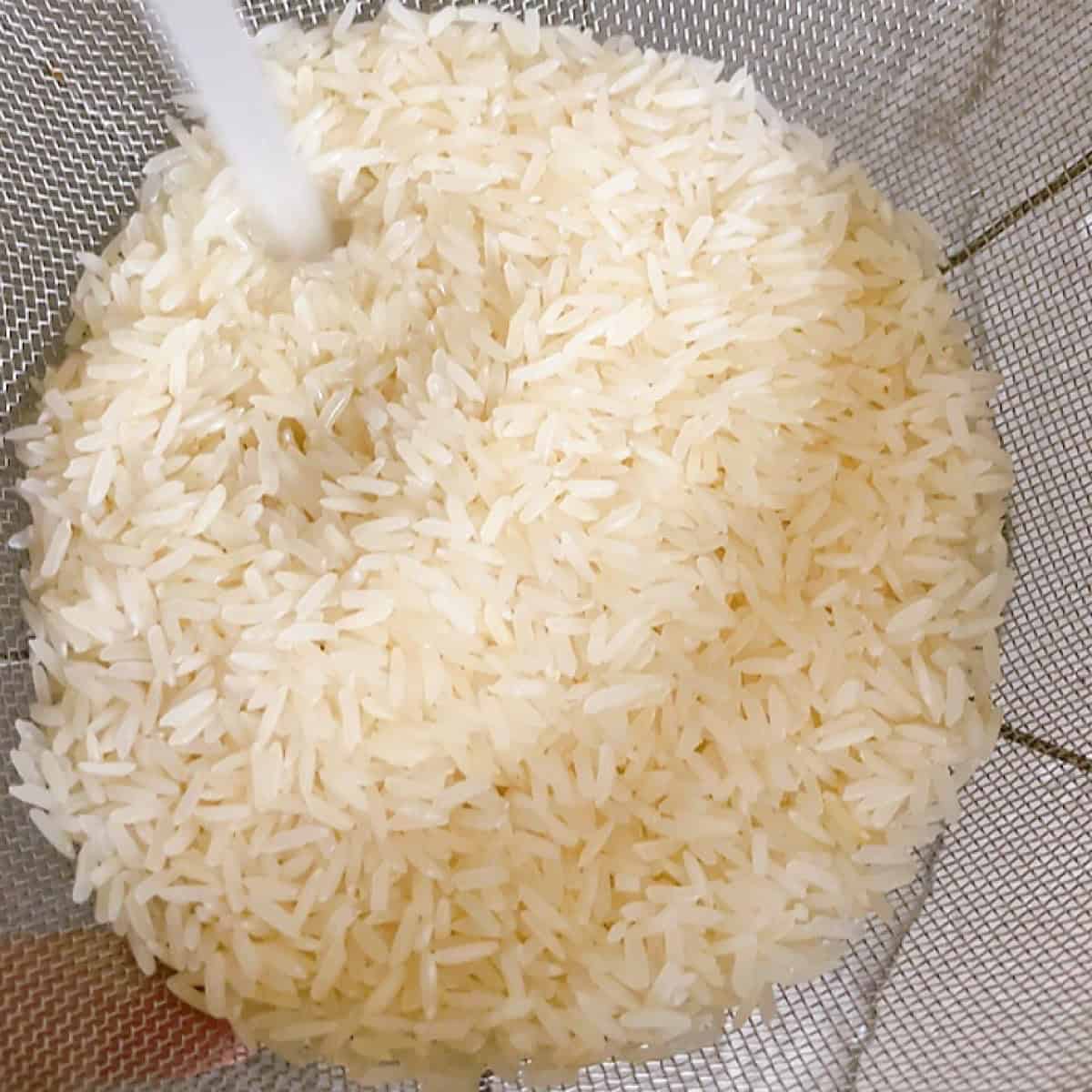 Jasmine rice instant pot recipe process shot 1 rinsing rice.