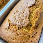 moist pumpkin bread feature image close up of two loaves freshly baked