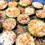 Fried zucchini with toasted panko in cast iron skillet.