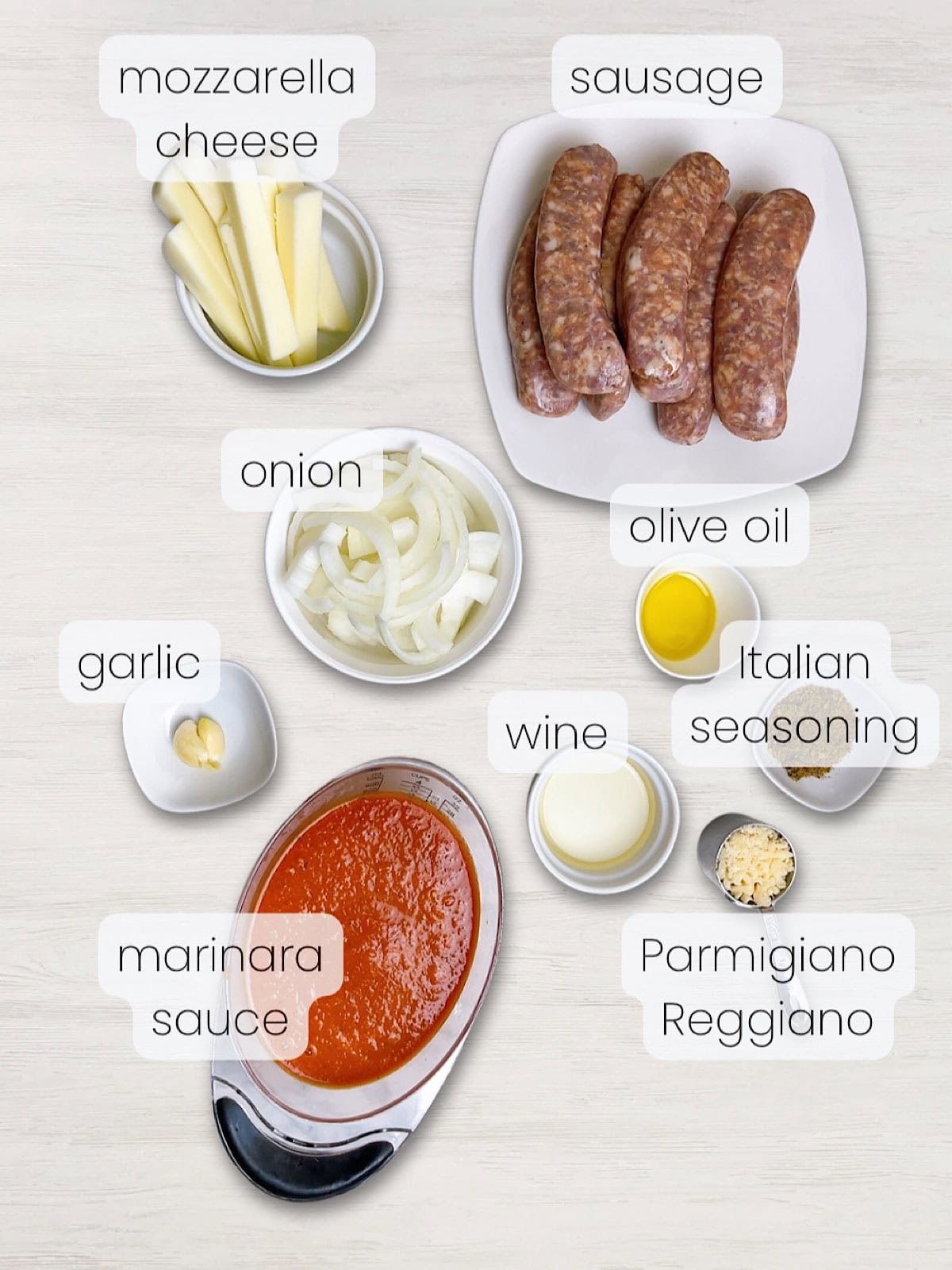 A labeled image of everything needed to make easy Italian sausage stuffed casserole.