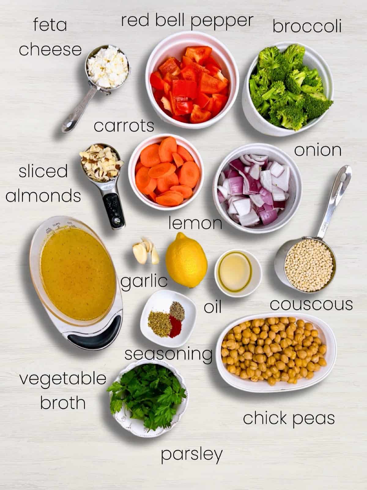 Easy couscous with roasted veggies chickpeas and feta ingredient shot.