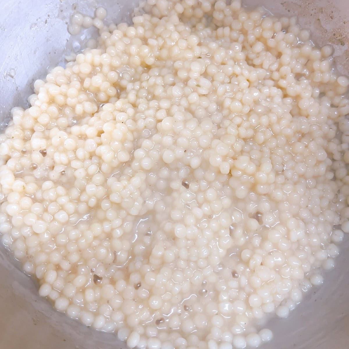 Couscous with roasted veggies, chickpeas, and feta process shot 3 boil couscous.