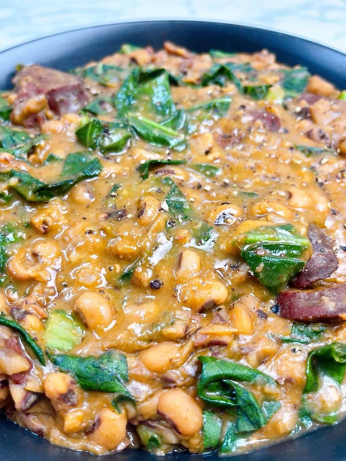 Easy instant pot black eyed peas with sausage and collard greens recipe hero image