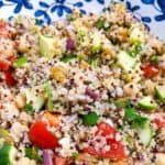 Quinoa power bowl with chickpeas and avocado close up feature shot.