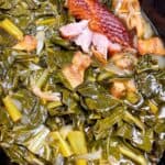Slow Cooker collard greens with smoked turkey feature image close up in crockpot