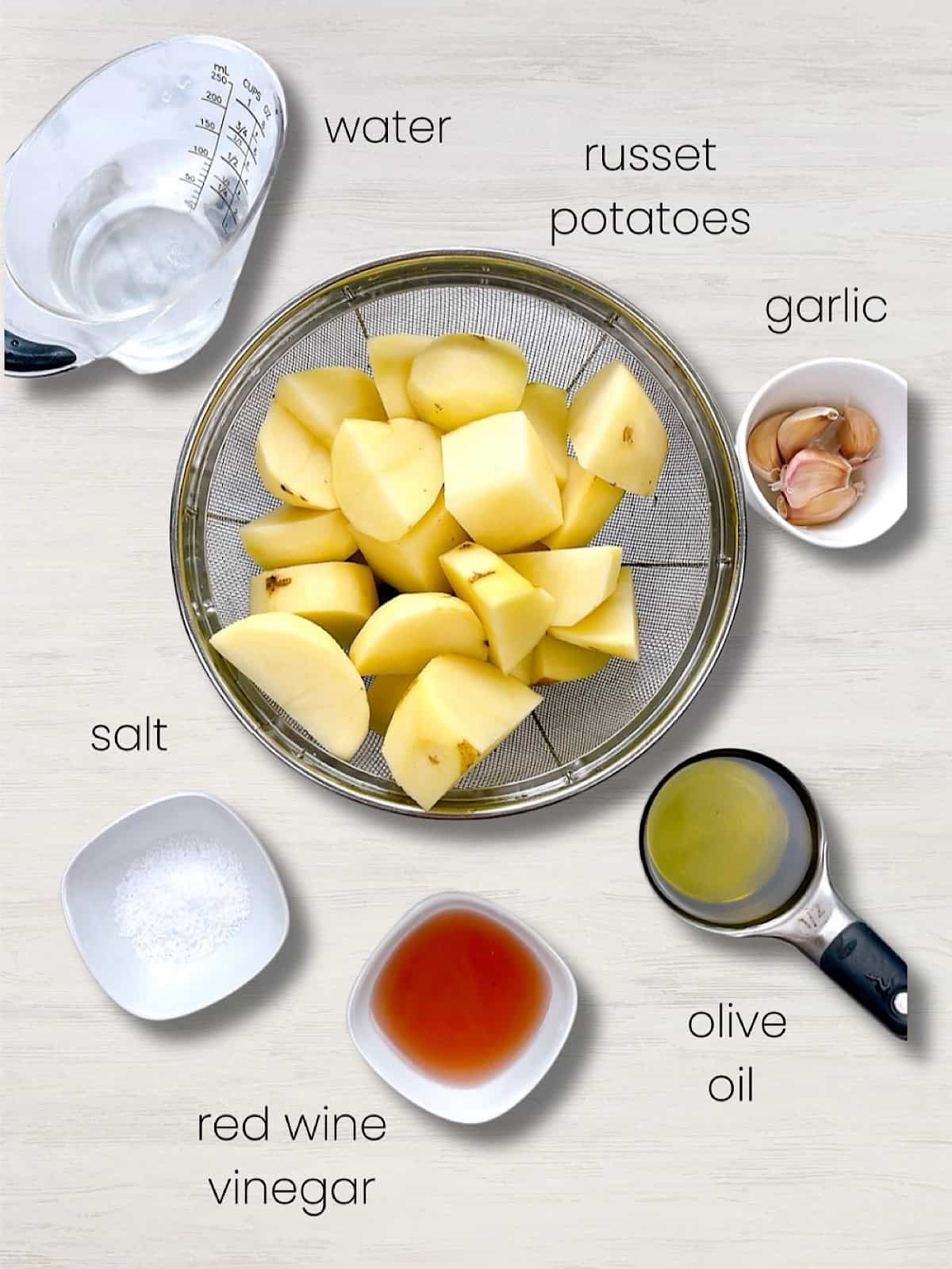 A labeled photo of all ingredients needed for this Skordalia Recipe