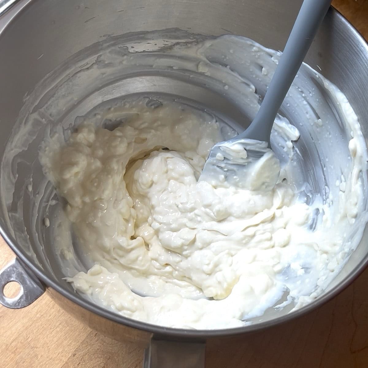 The creamy base in a stand mixer bowl.