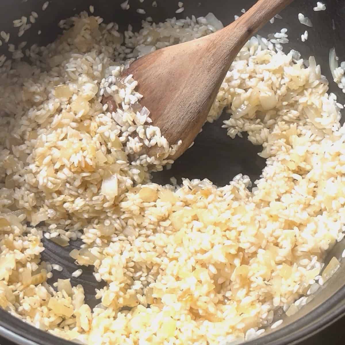Toasted rice with onion, garlic, and white white wine.