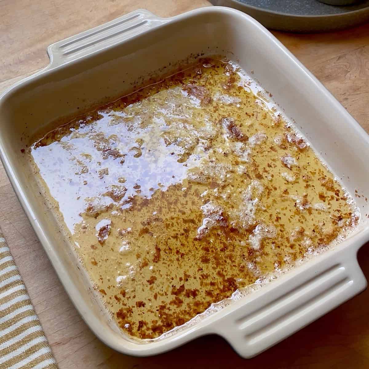 Browned butter in a ceramic dish.