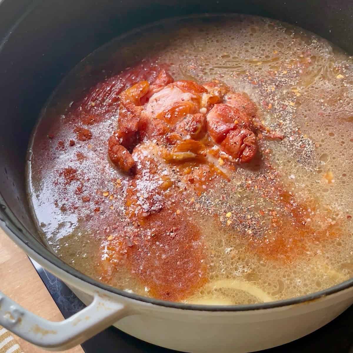 Smoked turkey, broth, and seasoning combined with onion.