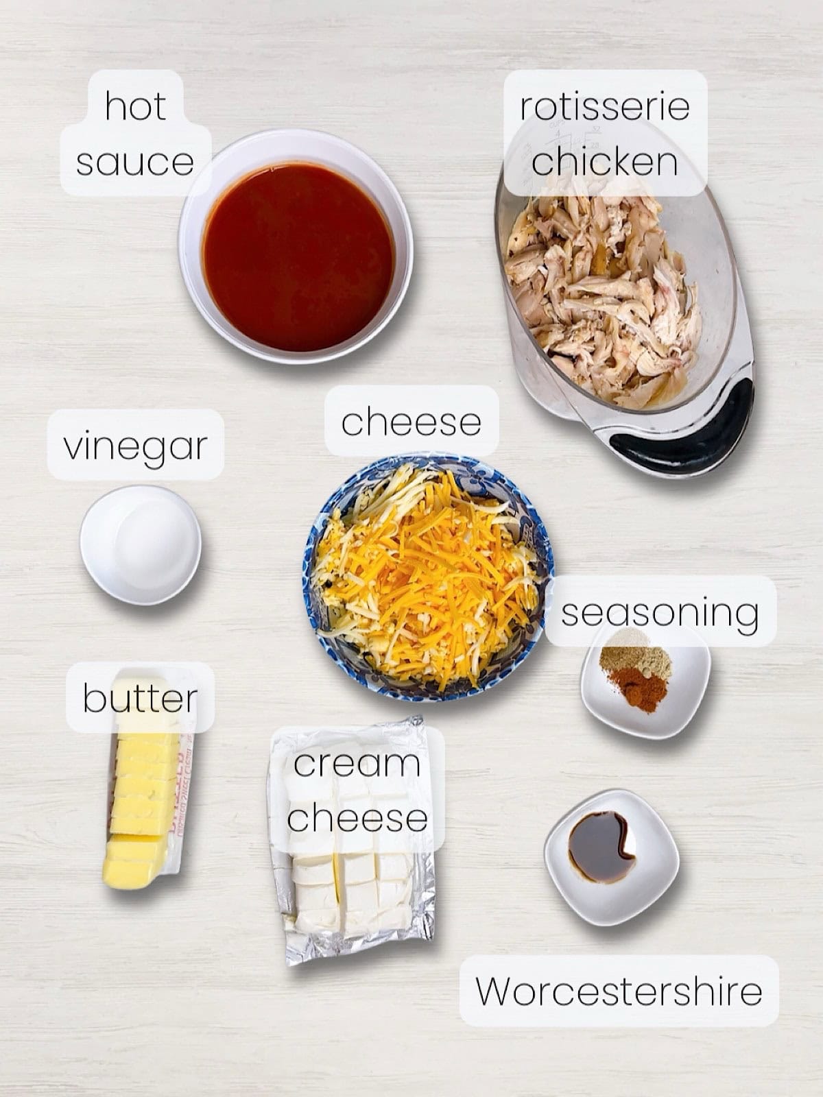 A labeled image of everything needed to make this easy instant pot buffalo dip.