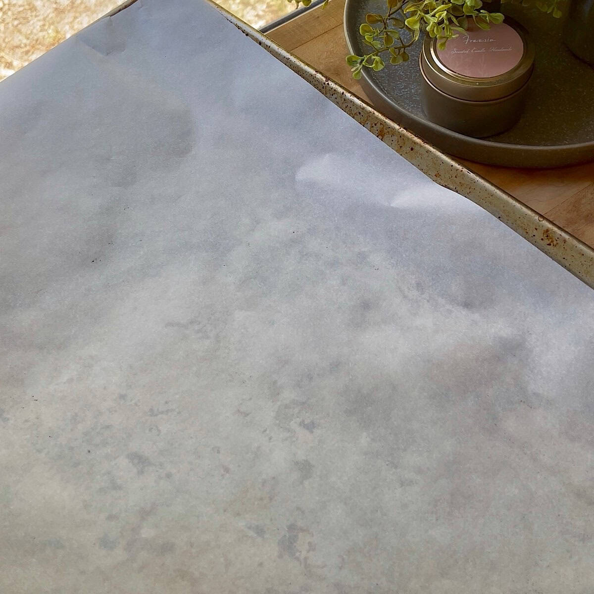 A baking sheet lined with parchment paper.