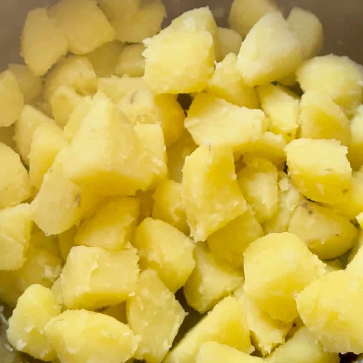 Potato chunks with rough edges.