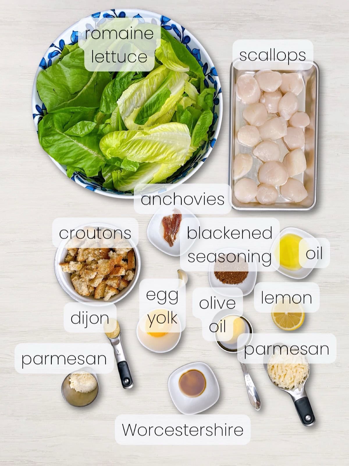 A labeled image of everything needed to make a blackened scallop  salad.