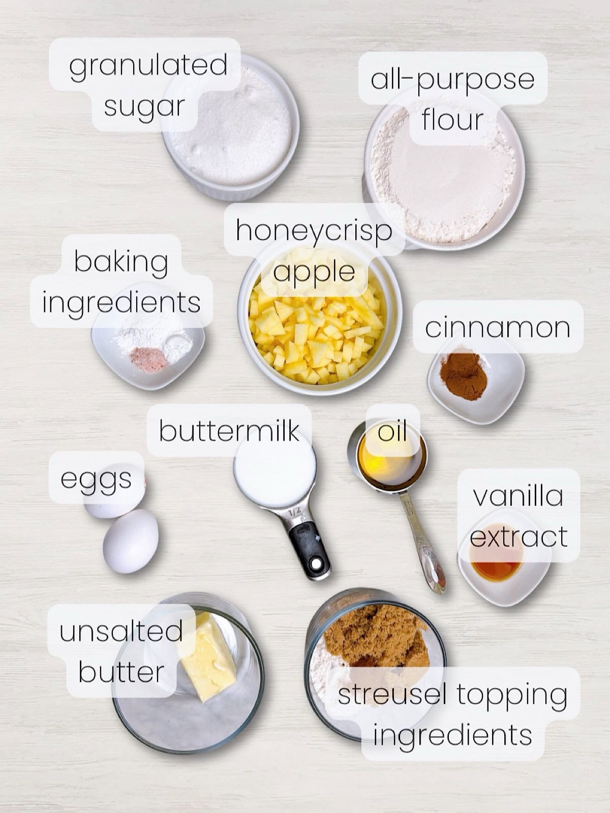A labeled image of everything needed to make apple streusel muffins jumbo bakery style.