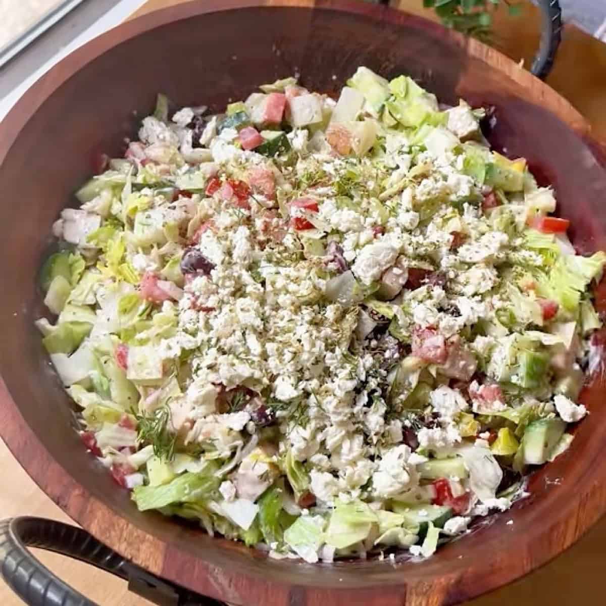 Chopped greek salad tossed with Greek yogurt dressing.