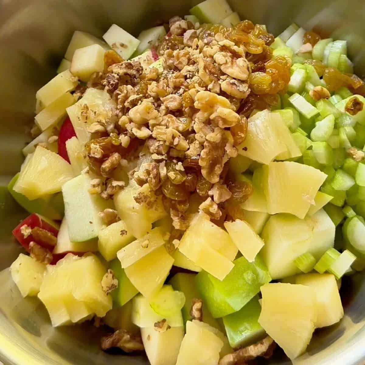 Bite sized chunks added to dressing.