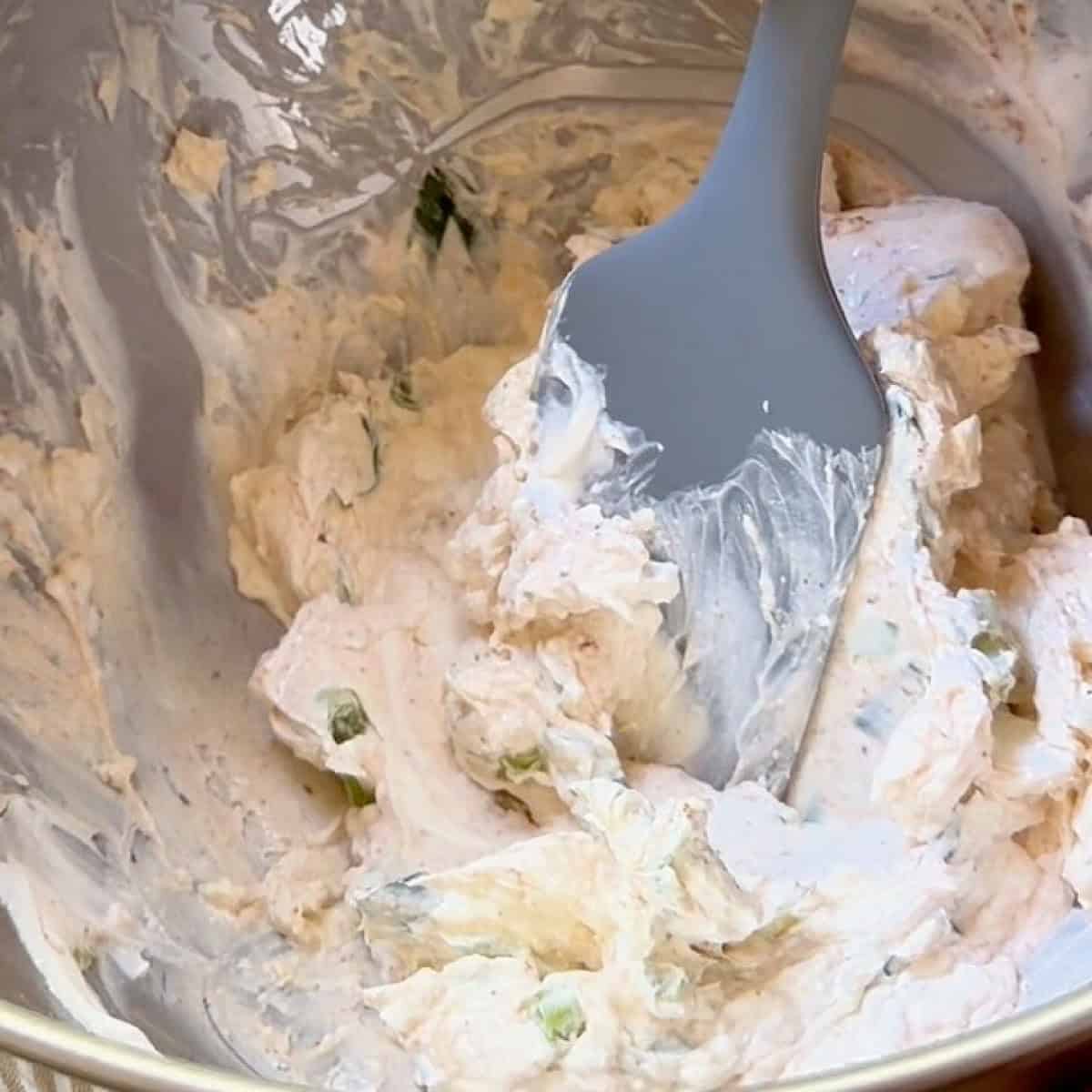 Mixing the cream cheese ranch base.