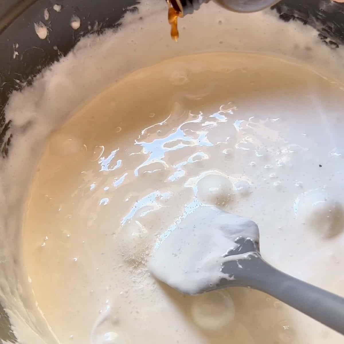 Melted marshmallow coating in a large pot.